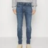 7 For All Mankind Slimmy Stretch Tek TwisterJeans Slim FitMid Blue Denim Uomo Jeans 7F122G0FK-K11