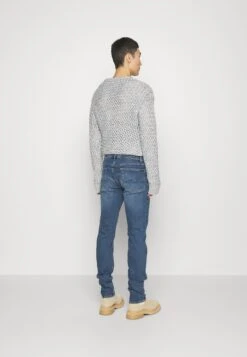 7 For All Mankind Slimmy Stretch Tek TwisterJeans Slim FitMid Blue Denim Uomo Jeans 7F122G0FK-K11 -Vendite 7 For All Mankind d8415e4ad6774a9081ee5db272cdde57